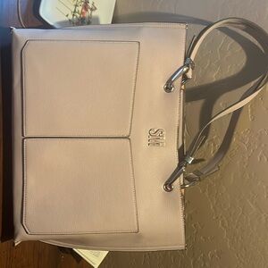 Blush colored Steve Madden handbag. Never used.